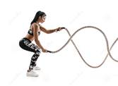 woman working with battle ropes